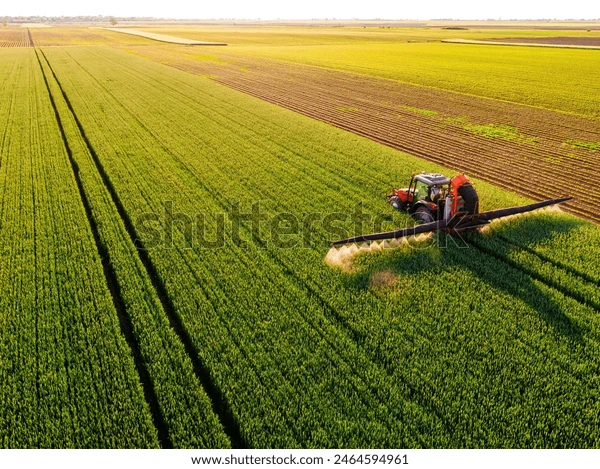drone shot tractor spraying lush 600w 2464594961